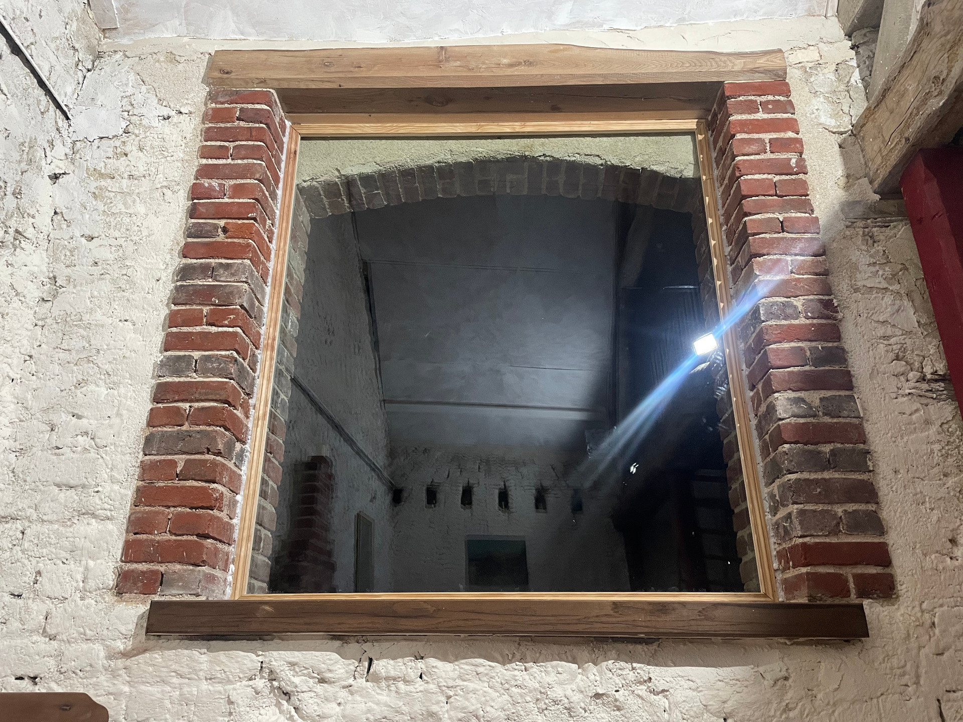 Création d'ouverture en briques en arc surbaissé